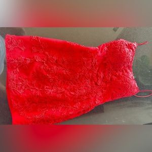 Red mini Sherri hill dress with lace up back number 53151. Size 6